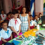 Niurka Gonzalez with educational aid in Cuban primary school